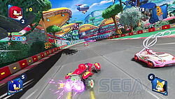 Knuckles driftet gerade an Amy vorbei, vor ihm liegt noch Big