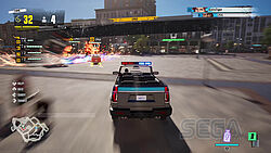 Taxix zertrümmern die Sperrbarriere bei Cops & Cabbies und befreien die Teamfahrer