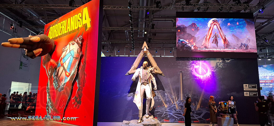 Riesiger Borderlands 4 Charakter vor einer Wand und Videoleinwand mit dem Tor, durch dieses er augenscheinlich kommt. Links kommt eine große Hand aus dem roten Borderlands 4 Logo