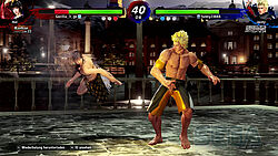 Jacky mit freiem Oberkörper und Strandhose bringt Aoi zu Fall