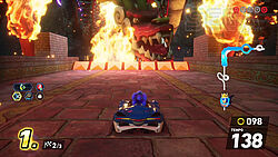 Sonic in einer Festung: vor ihm eine Sprungchance auf einen großen roten Drachen, überall gibt es Feuerflammen