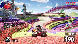 Shadow im Sprung auf eine Wiese mit unzähligen farbigen Blumen und Blüten